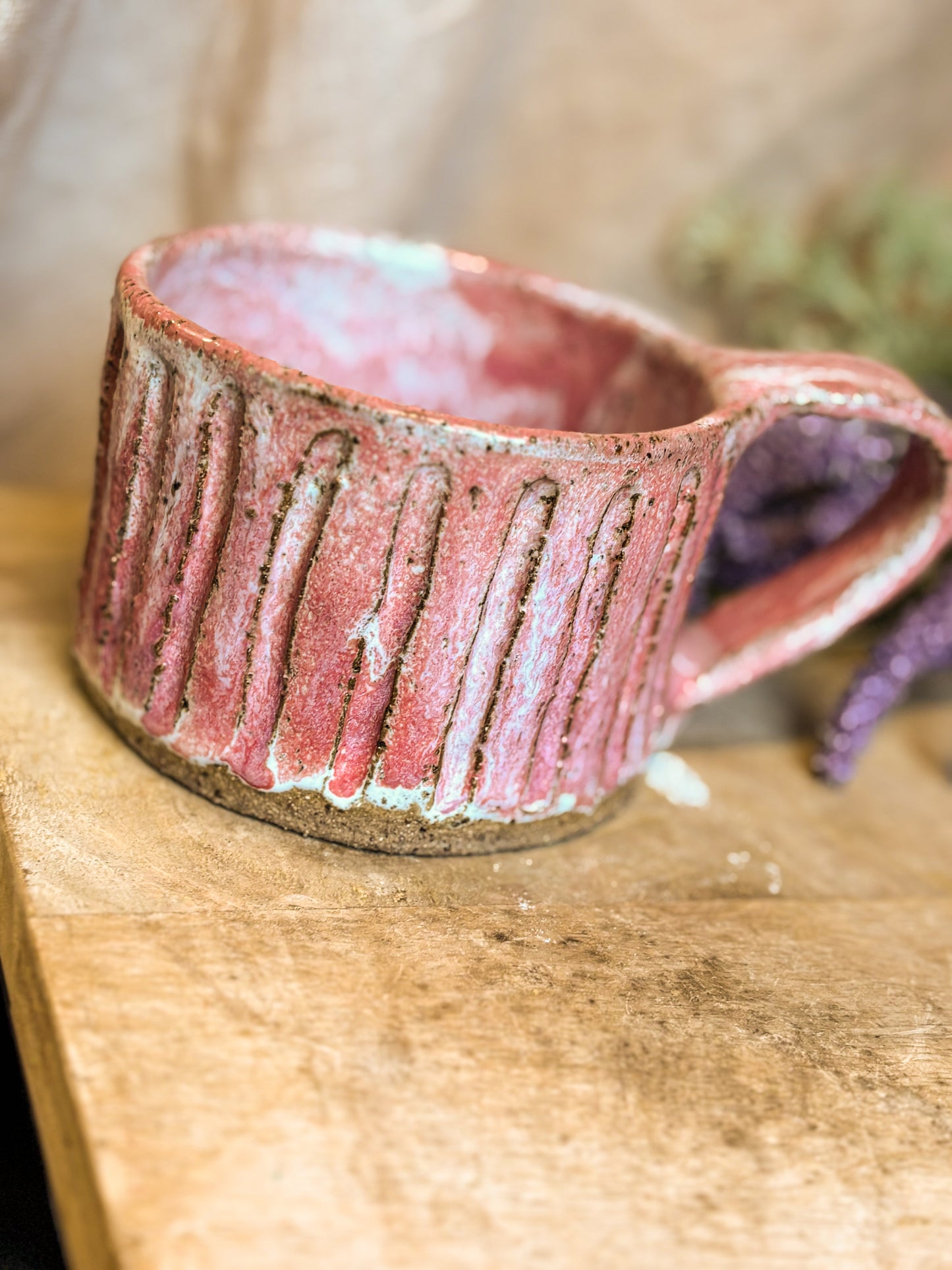 pink handmade mug with detail engraving