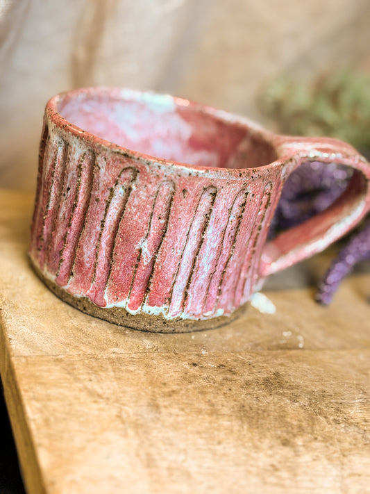 pink handmade mug with detail engraving