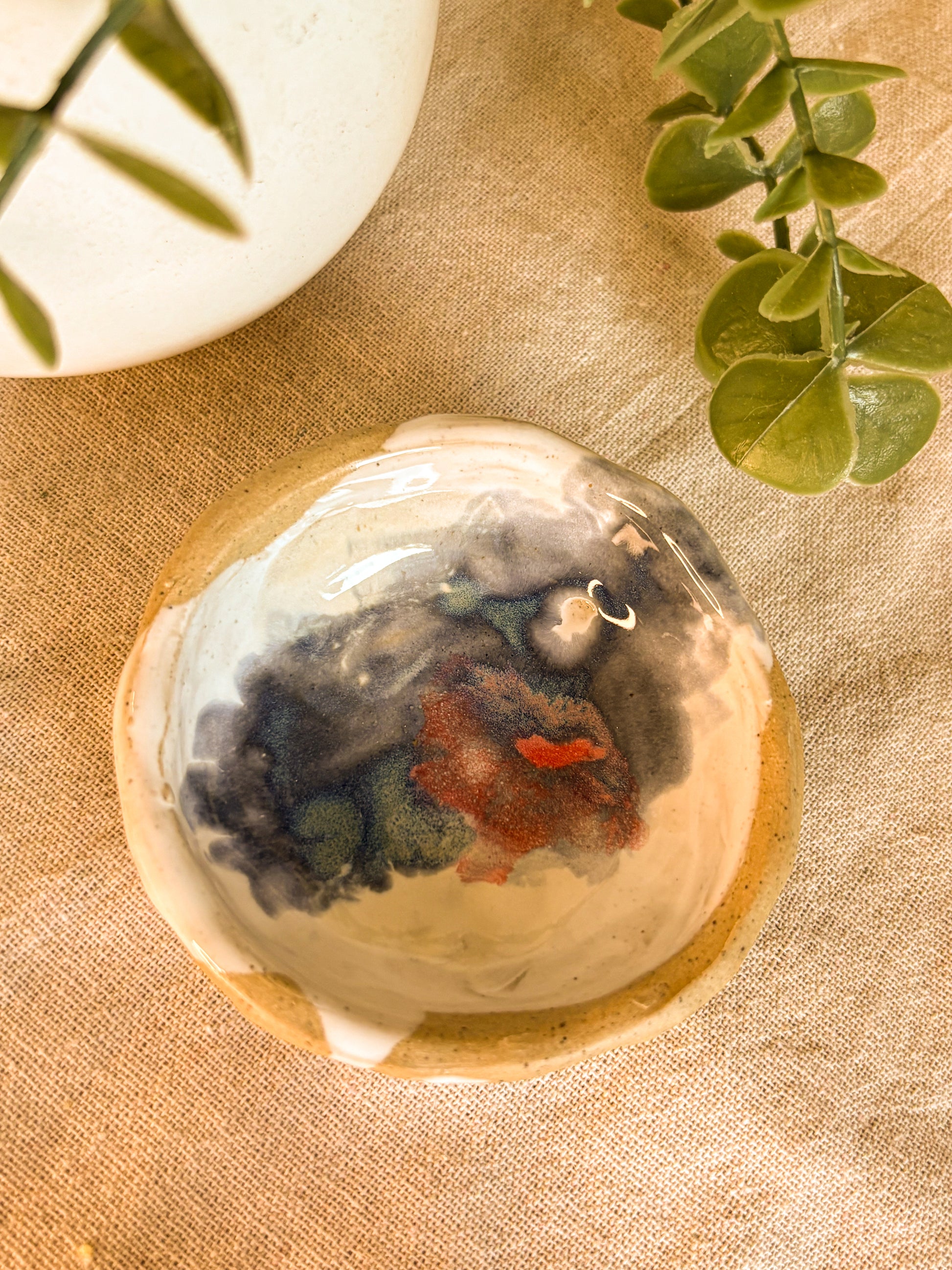 Trinket dish with purple and red glaze
