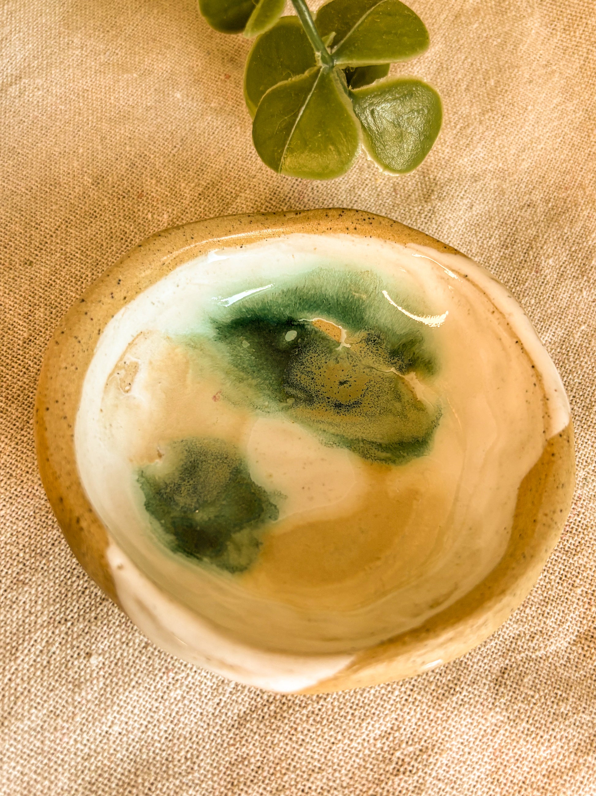 Ceramic trinket dish with green emerald glaze